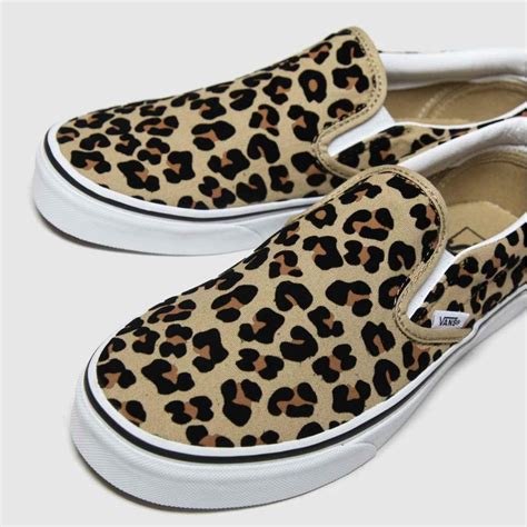 vans leopard print slip ons.